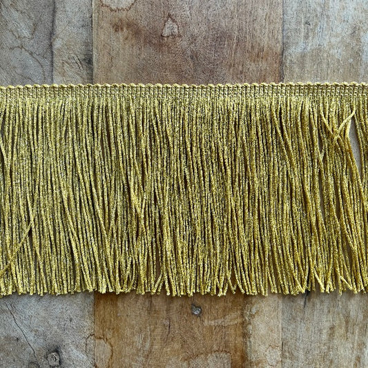 frangia per abiti in tripolino colore lurex alta 15 centimetri da cucire. Ideale per abbellire componenti per la casa come tovaglie o tende e vestiti fai da te oppure costumi